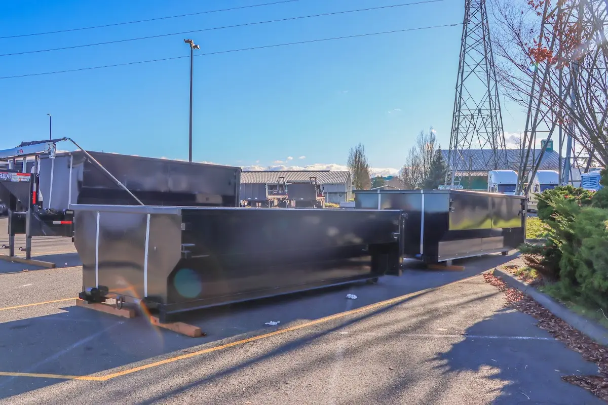 Roll-off dumpster ready for waste disposal at job site for Construction Dumpster Rental in Garden City